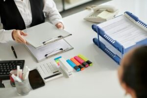 Social Worker Preparing Documents